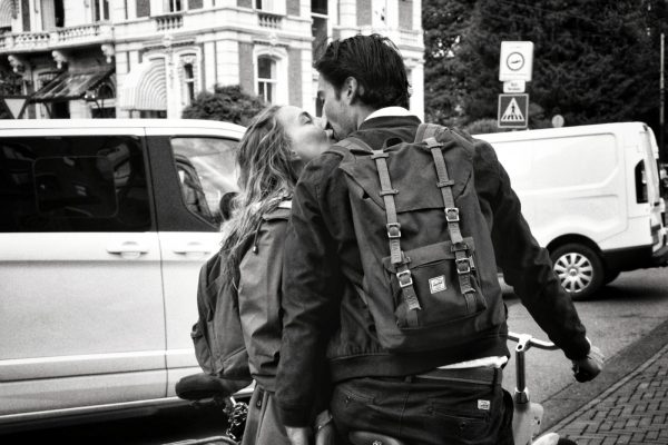 Kissing couples in the streets of Amsterdam