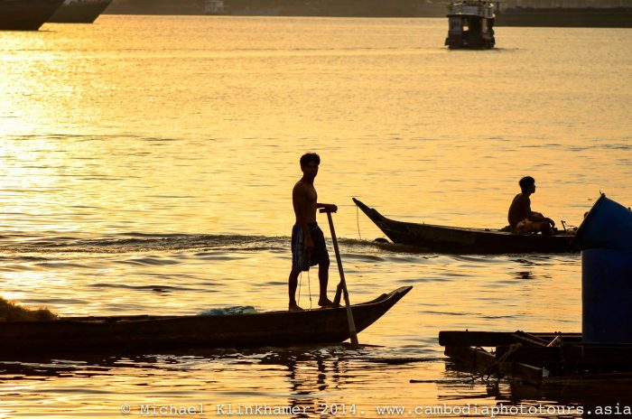 mekong river fisherman cambodia sunset