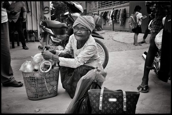Older Lady with Louis Vuitton Handbag in Phnom Penh