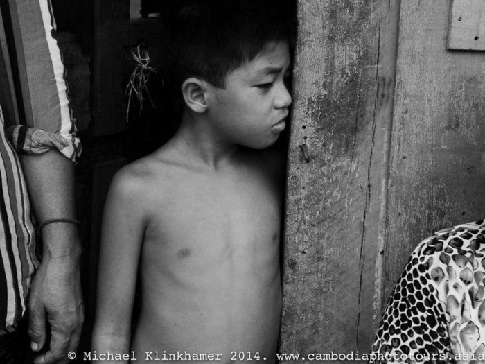 Boy in Cambodia living in darkness_klinkhamerphoto